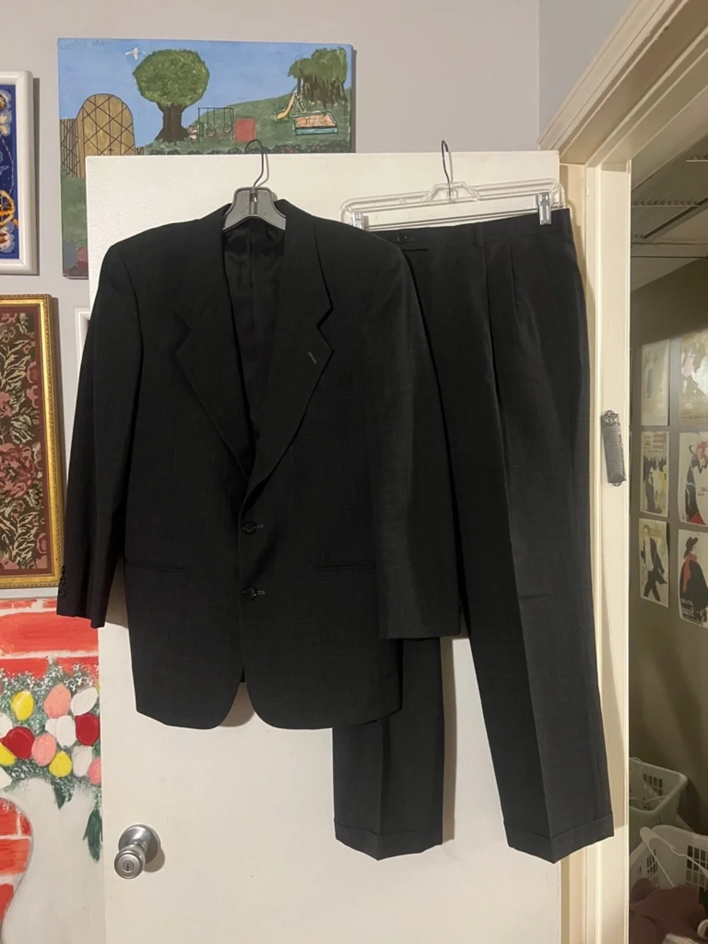 Jones New York dark gray single breasted suit. 100% wool gabardine.